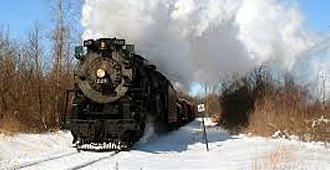 Steam Train in Snowy Field